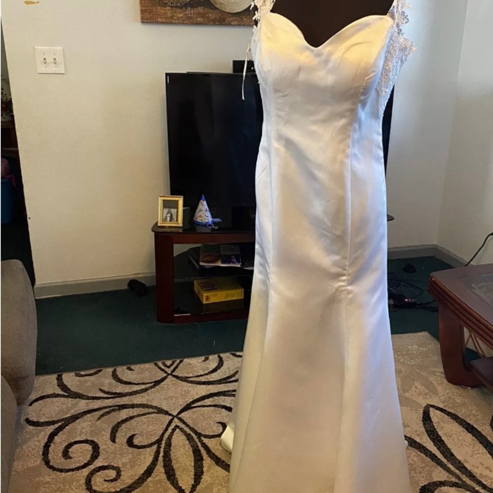Wedding Giwn by HEBEOS size 14 Beautiful Satin Like Gown With Small Train.